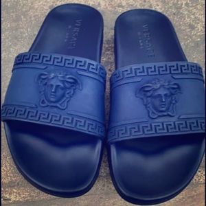 Blue women’s Versace slides